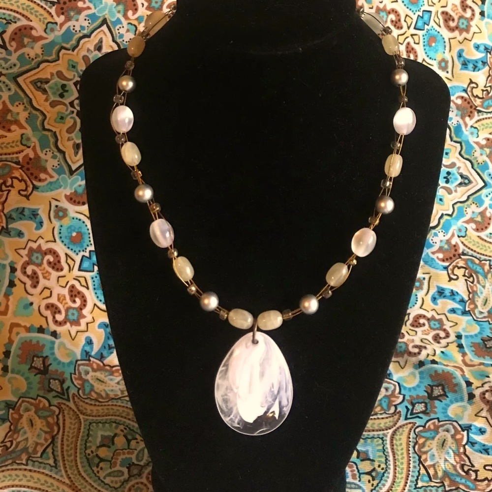 Wire wrapped beaded necklace with not so clear stone tear drop pendant